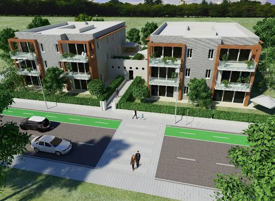 Rendering di un complesso residenziale di due palazzine con balconi e verde